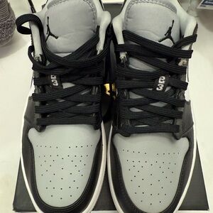 Jordan Gray and Black High-Top Sneakers